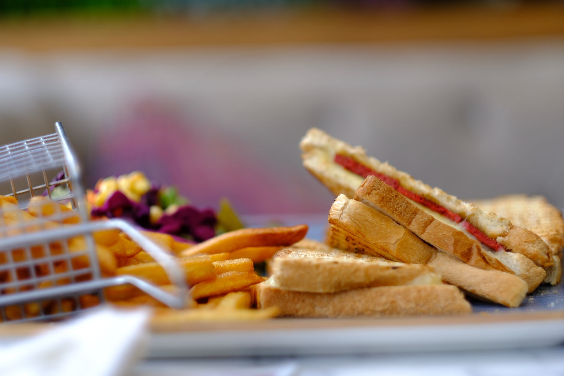 Stacked sandwich on a wooden board