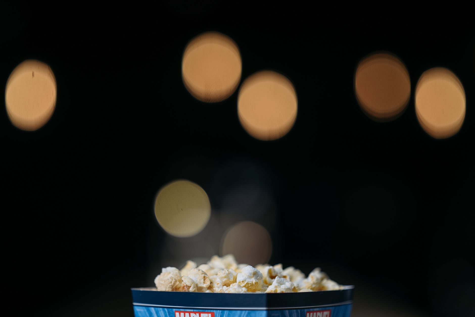 Bucket of popcorn at a movie theater