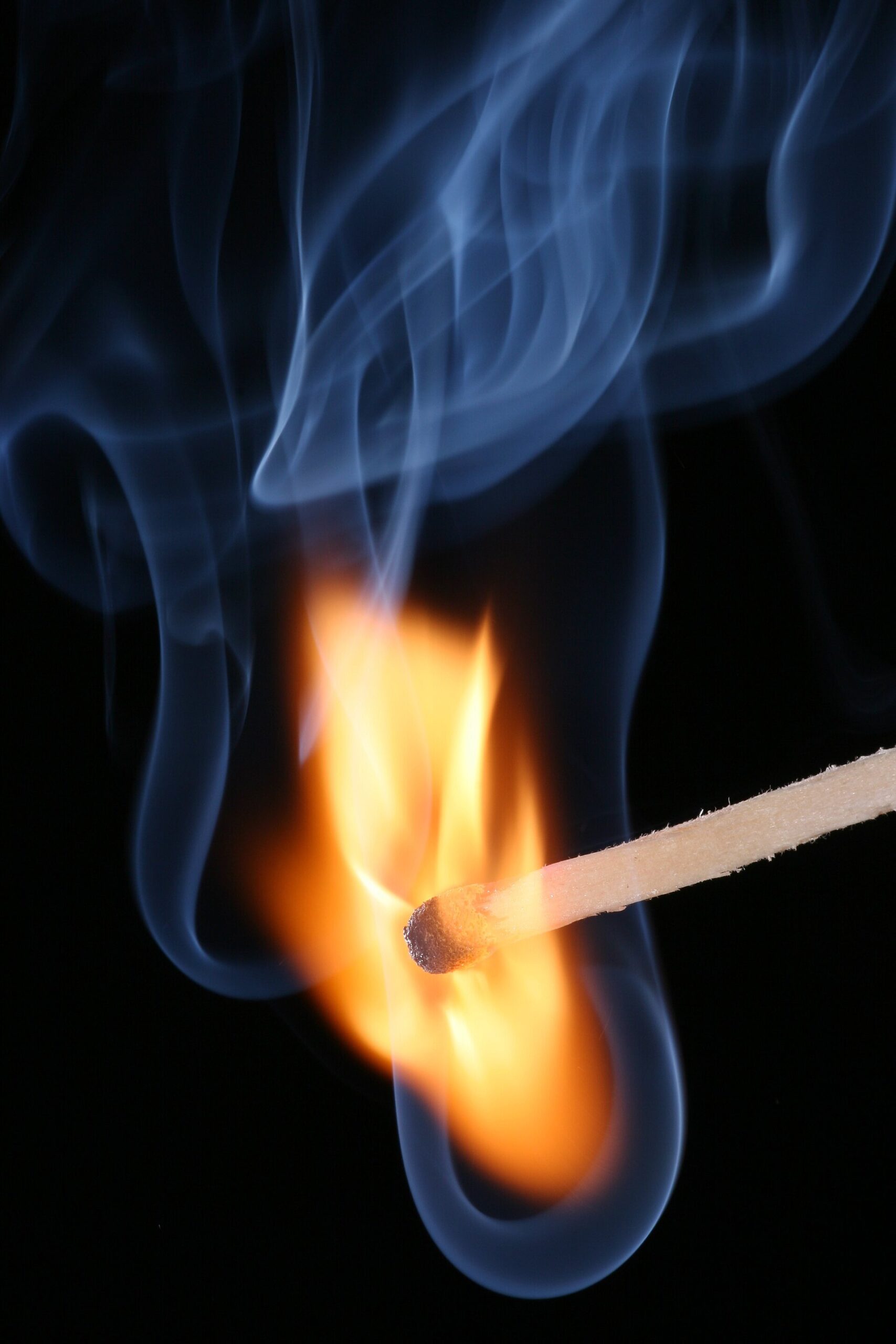 A friction match bursting into flame